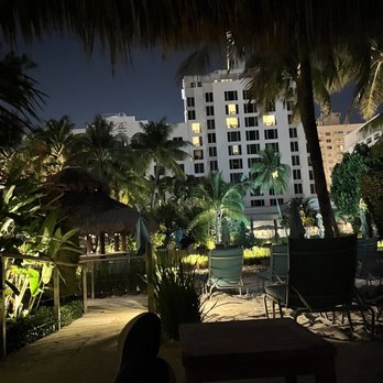 The Palms Hotel & Spa - Pool area cabana at night - Hotels Near Me - Miami Beach, Florida