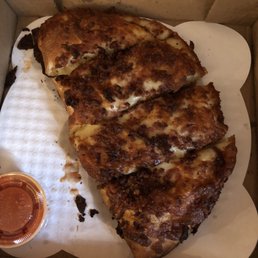 two slices of pizza in a box