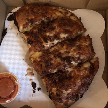 Dough Licious Pizza - two slices of pizza in a box - Pizza Near Me - Berkley, Massachusetts