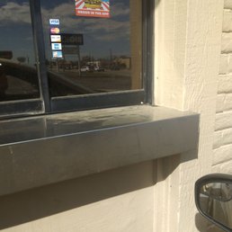 Drive-Thru pickup window. As seen from waiting customer's  driver's side window.