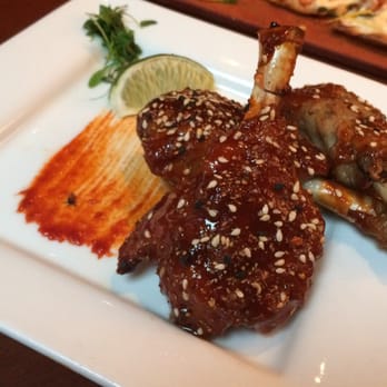 Seasons 52 - Duck wing lollipops - New American Near Me - Orlando, Florida
