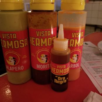 Tacombi - Hot sauces which are placed on the table - Mexican Near Me - Brooklyn, New York