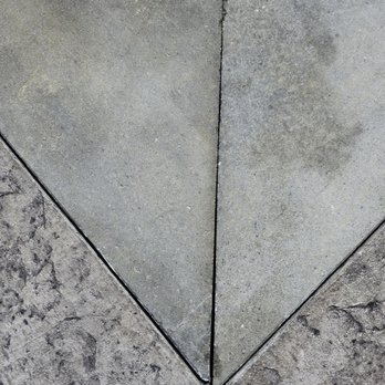 Alamode Concrete - Poorly done miter cuts in corners of coping stone which has lead to chipping. - Masonry/Concrete Near Me