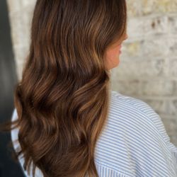 Jones, Salon Suite - The gloss and haircut package warmed up this clients overall color story, creating richness and depth while staining her grey hair.