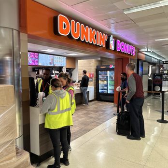 Dunkin - people at a dunkin donuts counter - Donuts Near Me - Chicago, Illinois Dunkin - people at a dunkin donuts counter - Donuts Near Me - Chicago, Illinois