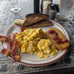 Rum Runners - American breakfast, with an extra side of eggs. Try Barons West Indian hot sauce. It's definitely more flavorful than hot.