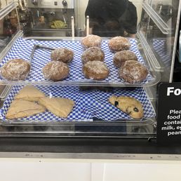 Taro Malasadas and scones display case Taro Malasadas and scones display case