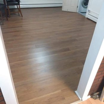 Tj's Construction - a hardwood floor in a kitchen - Tiling Near Me Tj's Construction - a hardwood floor in a kitchen - Tiling Near Me