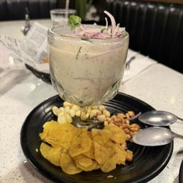 Peruvian ceviche with fresh fish, citrus marinade, red onions, corn and sweet potato