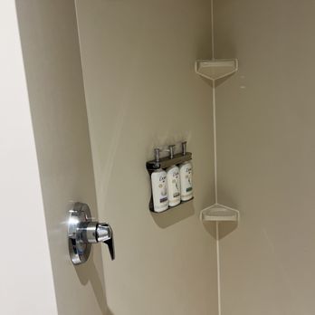 Holiday Inn Express & Suites Ocala - Tiny shower, hit my head on tight angle showering and poor not consistent water pressure - Hotels Near Me - Ocala, Florida