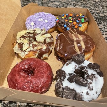 Wake N Bake Donuts - Assorted Doughnuts (I did trip while carrying them, but they still managed to survive the fall!) - Donuts Near Me - Carolina Beach, North Carolina Wake N Bake Donuts - Assorted Doughnuts (I did trip while carrying them, but they still managed to survive the fall!) - Donuts Near Me - Carolina Beach, North Carolina
