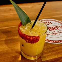 Cali Brews Mexican Grill - Mezcalita... A tropical twist, made with smoky mezcal, pineapple juice, passion fruit, and lime juice.