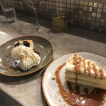 Emeril's Coastal - Limecello blueberry cheesecake and olive oil cake - Seafood Near Me - Miramar Beach, Florida Emeril's Coastal - Limecello blueberry cheesecake and olive oil cake - Seafood Near Me - Miramar Beach, Florida