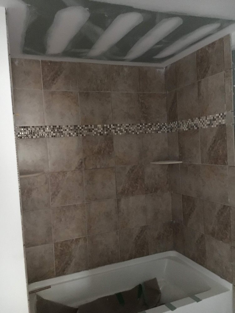 Slide of M.C.’s Home Repairs n Improvements