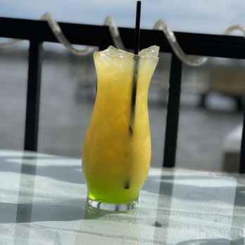 Horn Harbor Restaurant - a glass of orange juice on a table - American Near Me - Burgess, Virginia Horn Harbor Restaurant - a glass of orange juice on a table - American Near Me - Burgess, Virginia
