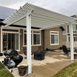 Zapp Exteriors - A charming, reverse, lattice patio cover! A perfect touch to this beautiful home. Call today (303-919-2049), to start your project!
