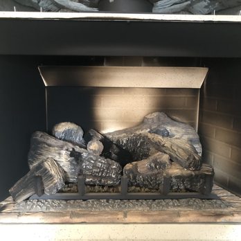 Stan's Fireplace Services - Soot covered fireplace because of misconfigured logs - Fireplace Services Near Me Stan's Fireplace Services - Soot covered fireplace because of misconfigured logs - Fireplace Services Near Me