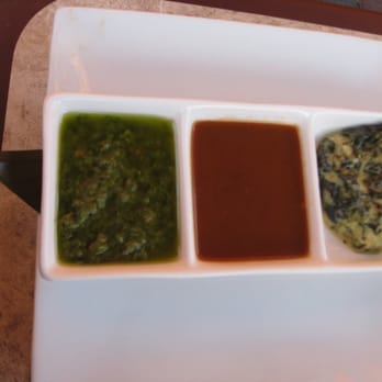 Brasitas - Here are the 3 chimichurri sauces served with the Parrillada - Spanish Near Me - Stamford, Connecticut Brasitas - Here are the 3 chimichurri sauces served with the Parrillada - Spanish Near Me - Stamford, Connecticut