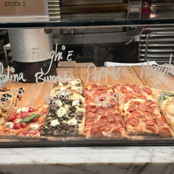 Stock Bar - Pizza slices - Steakhouses Near Me - Toronto, Ontario Stock Bar - Pizza slices - Steakhouses Near Me - Toronto, Ontario