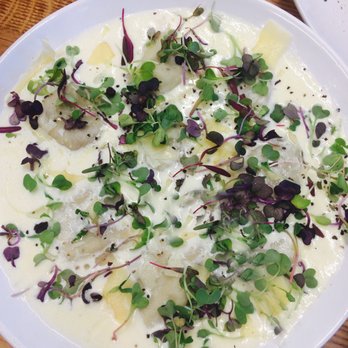 Mour Cocina | Bodega - Beef Ravioli with Truffle Cream Sauce - Wine Bars Near Me - Austin, Texas