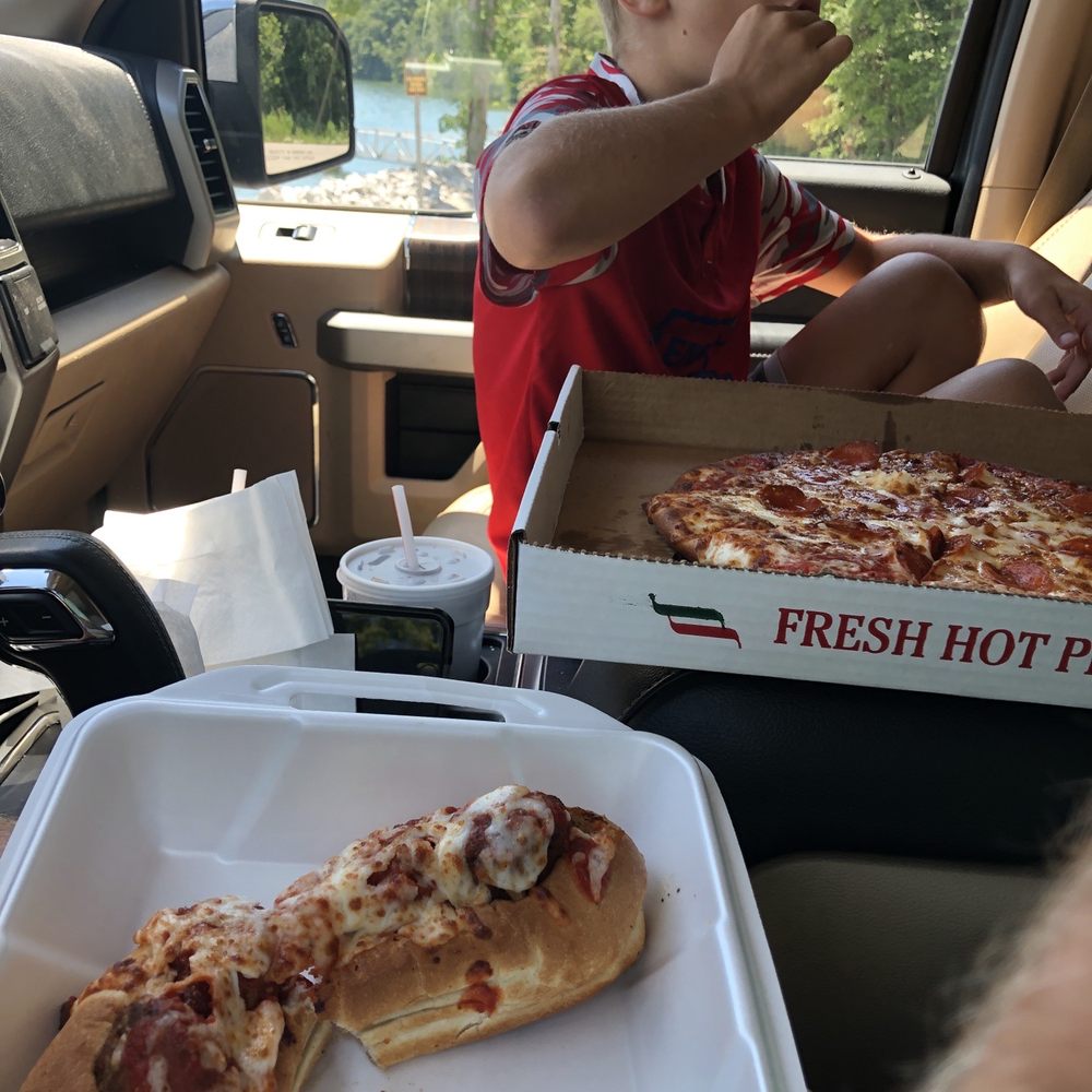 Pizza Station - Chuck workin on a large pepperoni - Pizza Near Me - Rockwood, Tennessee Pizza Station - Chuck workin on a large pepperoni - Pizza Near Me - Rockwood, Tennessee