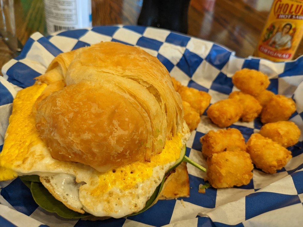 Nonie's Bakery & Cafe Logo