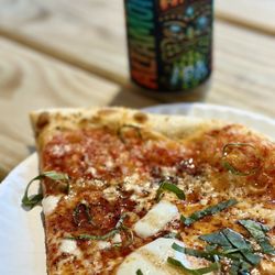 Pizza by the slice and Altamint brewery beer
