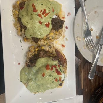 The Pan - Barbacoa beef on top of corn cakes , cream corn, and poblano sauce - Pizza Near Me - Gardena, California