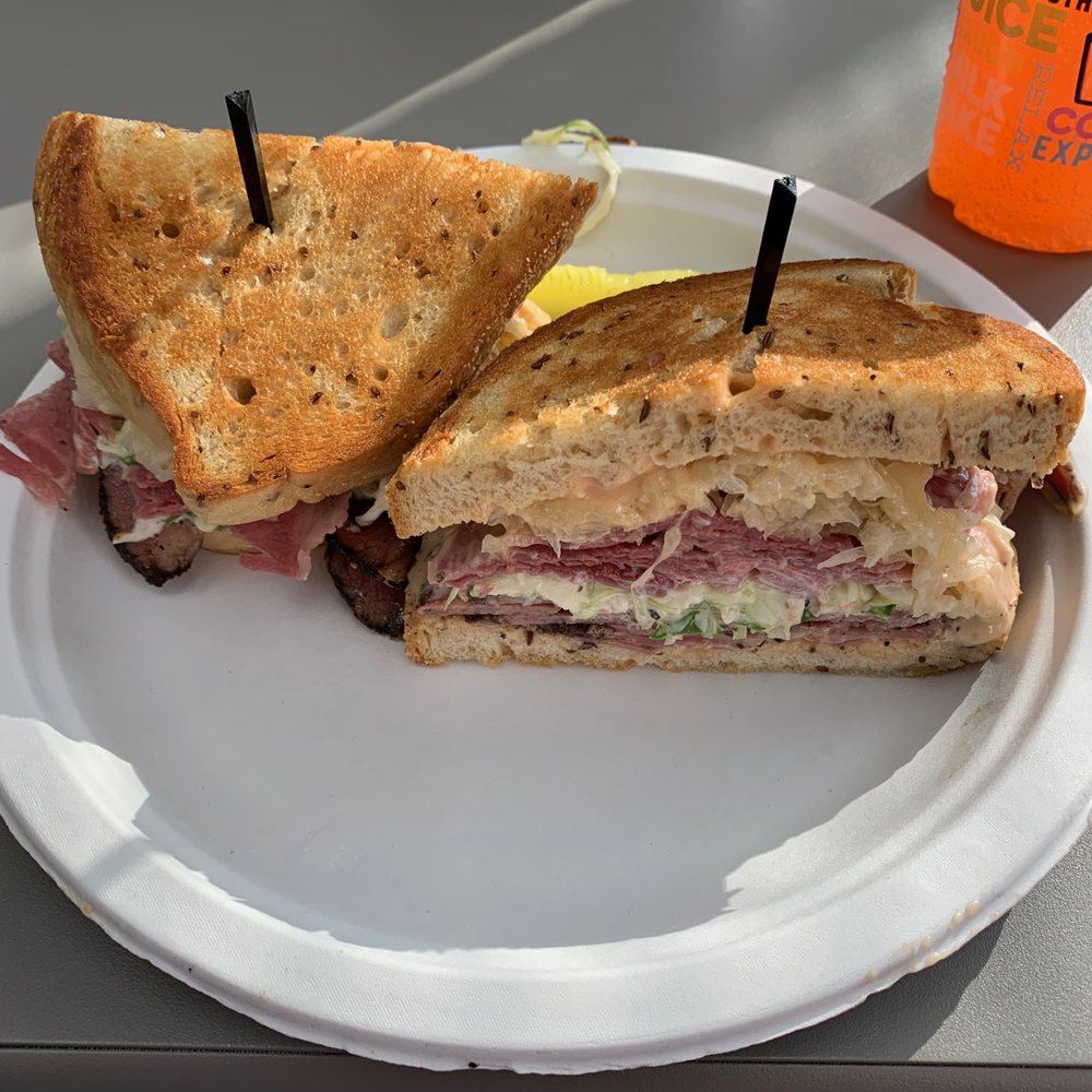 Corned Beef King - Identity Crisis, corned beef, pastrami, Swiss cheese, coleslaw, Russian dressing on grilled rye - Sandwiches Near Me - Rockville, Maryland