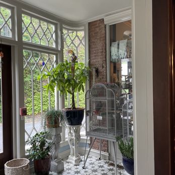ThreeBirds Coffee House - a patio with a birdcage and potted plants - Coffee & Tea Near Me - Easton, Pennsylvania ThreeBirds Coffee House - a patio with a birdcage and potted plants - Coffee & Tea Near Me - Easton, Pennsylvania