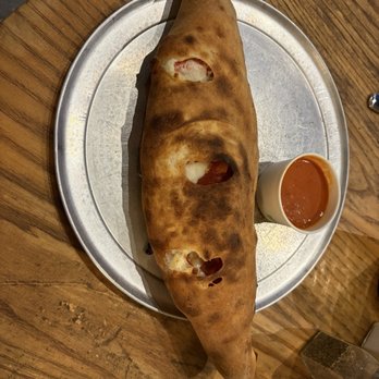 Repetti's Pizza and Provisions - Pepperoni calzone - Pizza Near Me - Honolulu, Hawaii Repetti's Pizza and Provisions - Pepperoni calzone - Pizza Near Me - Honolulu, Hawaii