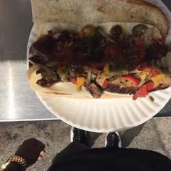 Vic's Chuck Wagon - Hefty Sausage Sub emerges, garlic hero, Vic's Chuck Wagon.