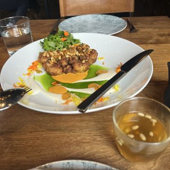 Aziza - Cauliflower with muhammara, pine nuts, urfa oil and raisins and Moroccan mint tea (with pine nuts!) - Moroccan Near Me - San Francisco, California