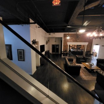 Hunter Arms Hotel - Descending lobby staircase - Hotels Near Me - Saint Cloud, Florida