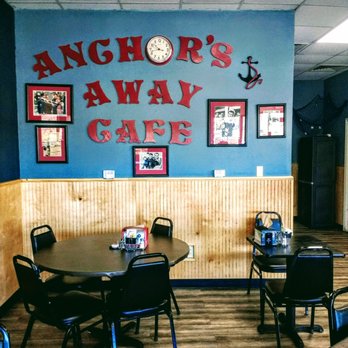 Anchors Away Cafe - tables and chairs with a clock on the wall - New American Near Me - Spruce Pine, North Carolina Anchors Away Cafe - tables and chairs with a clock on the wall - New American Near Me - Spruce Pine, North Carolina