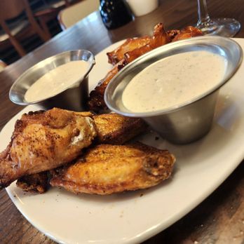 Burtons Grill & Bar - Signature Wings ( 1/2 maple sriracha;  1/2 dry rub) - New American Near Me - Richmond, Virginia