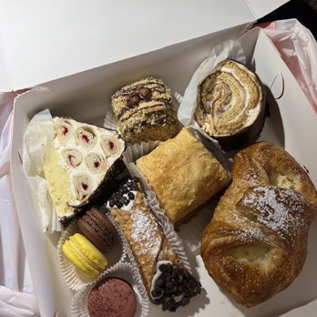 Manan Bakery - From Top left: Luxor cake, Nutella cake, milk roll cake, macaroons, cannoli, baklava, cheese danish - Bakeries Near Me - Las Vegas, Nevada