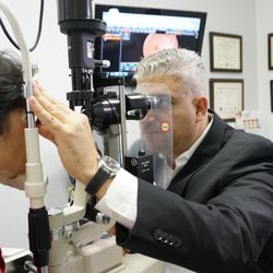 Eyes On Brickell - Dr Copty preforming 90 Diopter fundus evaluation