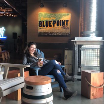 Blue Point Brewing - Adirondack chairs near the windows - Brewpubs Near Me - Patchogue, New York Blue Point Brewing - Adirondack chairs near the windows - Brewpubs Near Me - Patchogue, New York