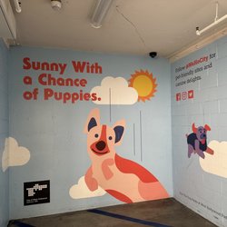 West Hollywood Public Parking - Level 3 mural. Sunny with a chance of puppies sounds like the perfect weather forecast!