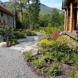 3 Lakes Landscaping - Crushed stone driveways can be softened by zone-appropriate, low-maintenance plantings.