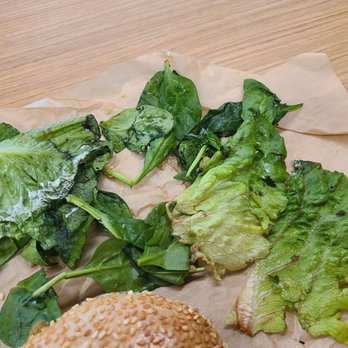 Einstein Bros. Bagels - It was a Veg Out bagel with way too old lettuce and squishy spinach. How can you serve this? Where are your standards? - Bagels Near Me - Fairfax, Virginia