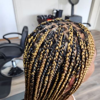 1. Aunty Show Hair Braiding
