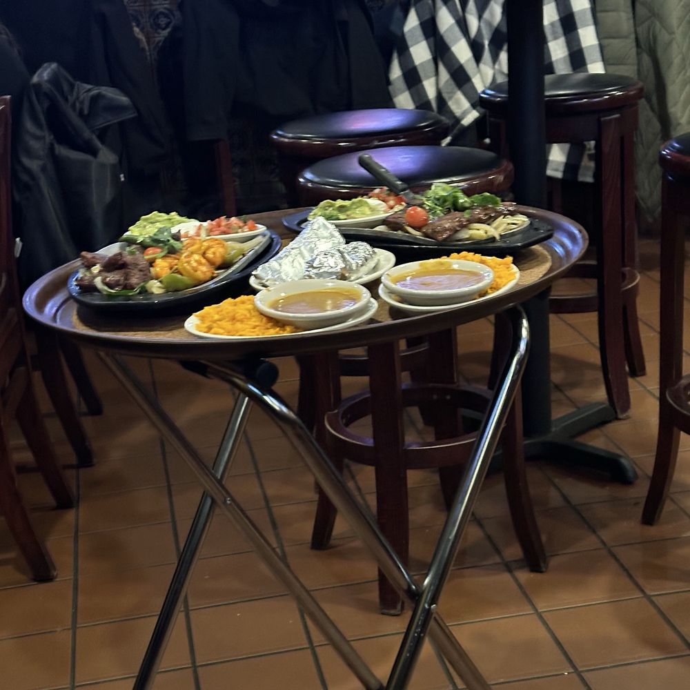 Villa Maya - Our sizzling and steaming fajita platters sitting for minutes after they lost their sizzle and steam - until I served the table. - Tex-Mex Near Me - Rockville, Maryland Villa Maya - Our sizzling and steaming fajita platters sitting for minutes after they lost their sizzle and steam - until I served the table. - Tex-Mex Near Me - Rockville, Maryland