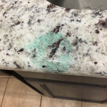 Superior Stone and Cabinet - Large green spot with chip in the middle from the installers. - Cabinetry Near Me - Phoenix, Arizona Superior Stone and Cabinet - Large green spot with chip in the middle from the installers. - Cabinetry Near Me - Phoenix, Arizona