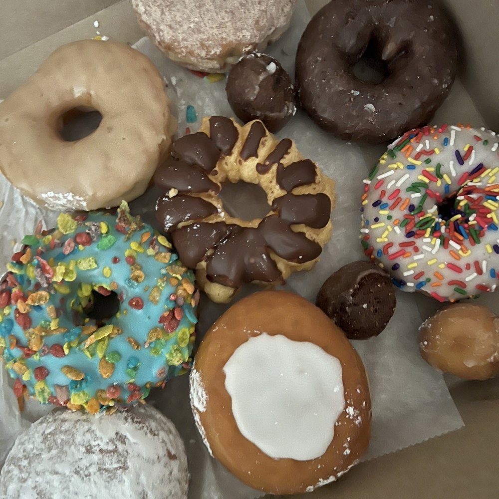 a variety of donuts in a box a variety of donuts in a box