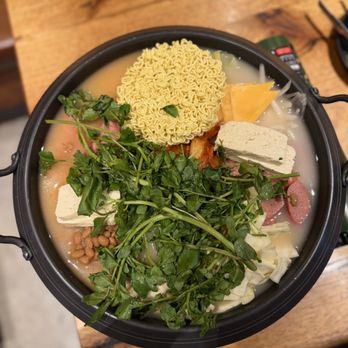 Haejang - 44.95 Army Stew(Budae Jjigae) 8/10 Although it's a simple dish to prepare at home, it's a classic that turned out to be delicious. - Korean Near Me - New York, New York Haejang - 44.95 Army Stew(Budae Jjigae) 8/10 Although it's a simple dish to prepare at home, it's a classic that turned out to be delicious. - Korean Near Me - New York, New York