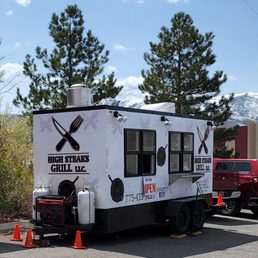 a food truck parked in a parking lot