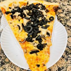 Benny Tudino's - This pizza was dry, lacked flavor,  sauce & cheese