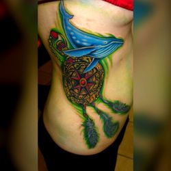 Color rib tattoo by Geno
